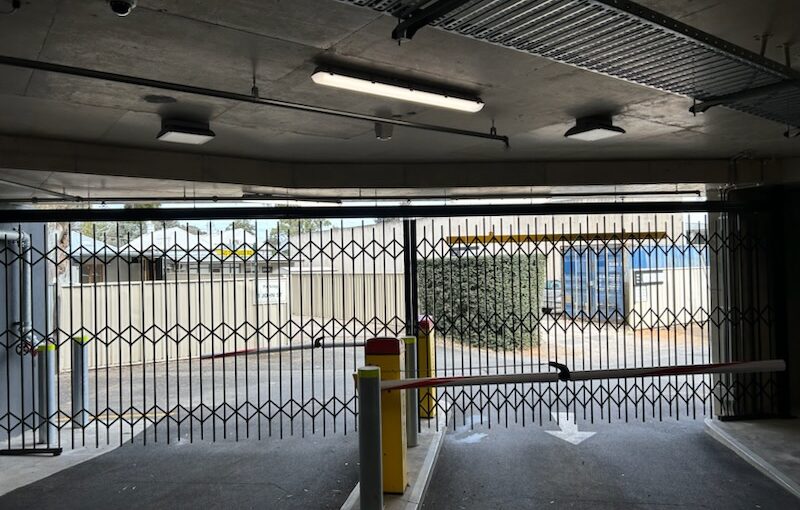 Expandable barrier for commercial car park entries  and other low headroom applications